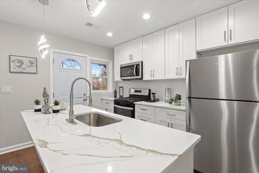 1241 E BELVEDERE AVE, BALTIMORE, MD, 21239